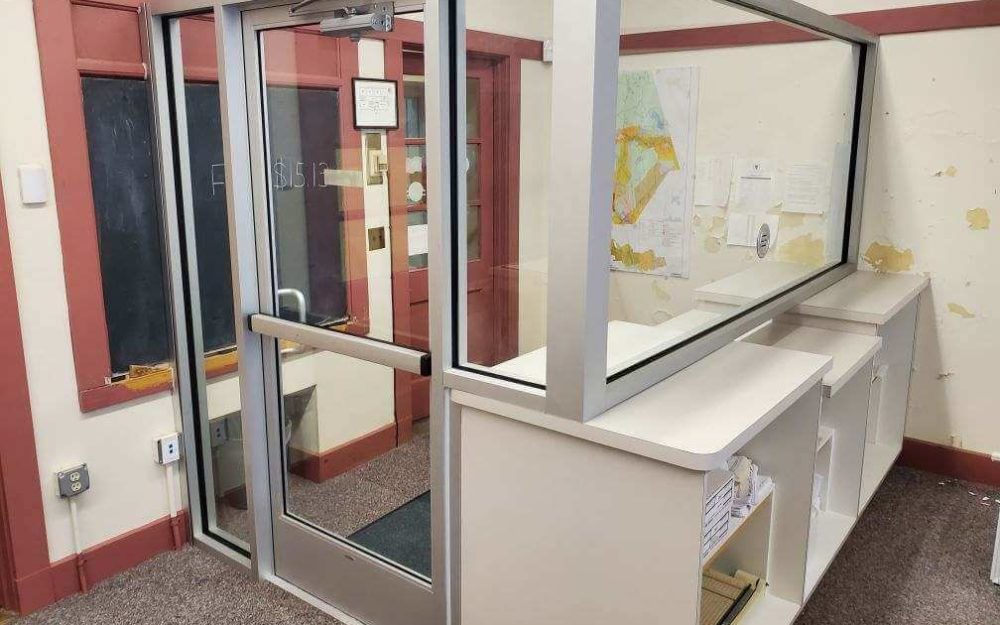 Alternate angle of the custom glass door by Modern Glazing