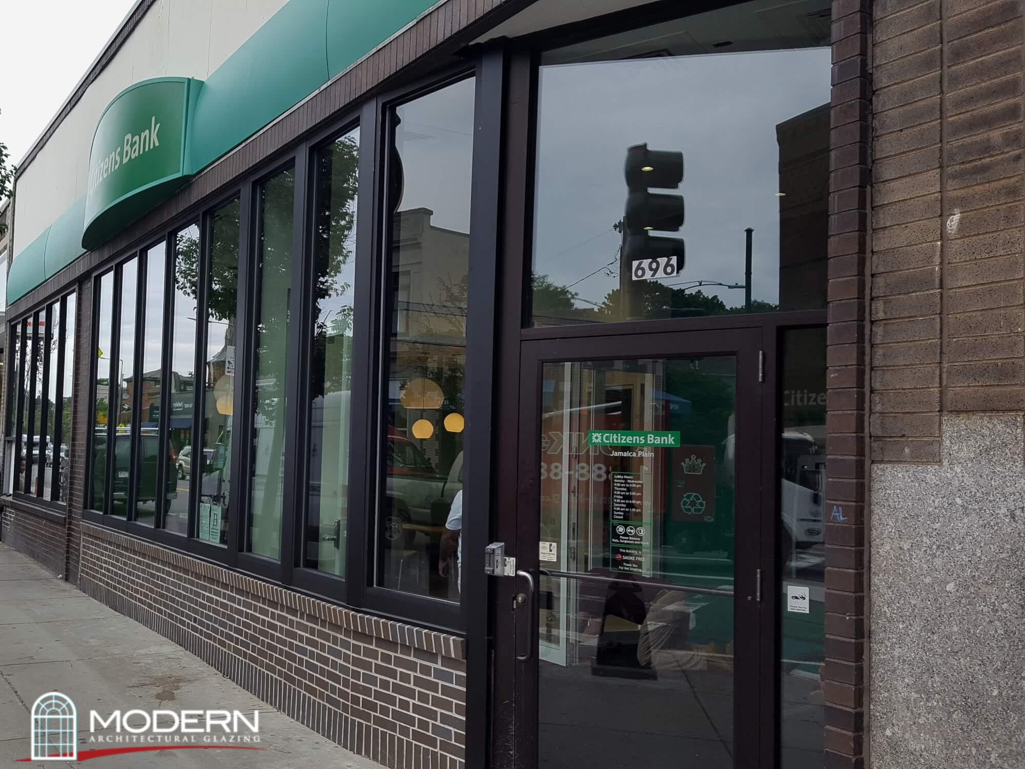 Glass Storefronts vs. Curtain Walls - A Guide for Business Owners - storefront glazing, glass storefront, storefront windows, storefront window replacement, aluminum storefront systems - Modern Glazing